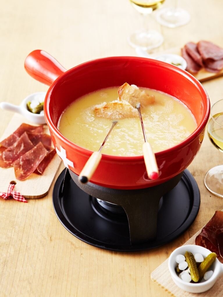Dónde comer en Ginebra: restaurantes recomendados 5 Descubre la fondue y otros platos suizos
